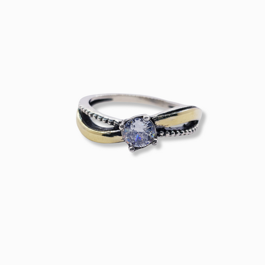 ANILLO ENTRELAZADO BICOLOR CON CIRCON CENTRAL