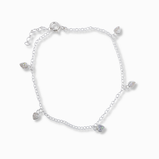 PULSERA DE PLATA CON DIJES DE CORAZÓN